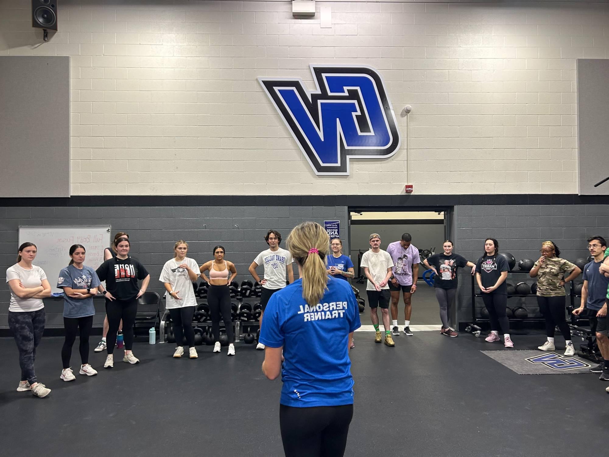 Students participating in group fitness class.